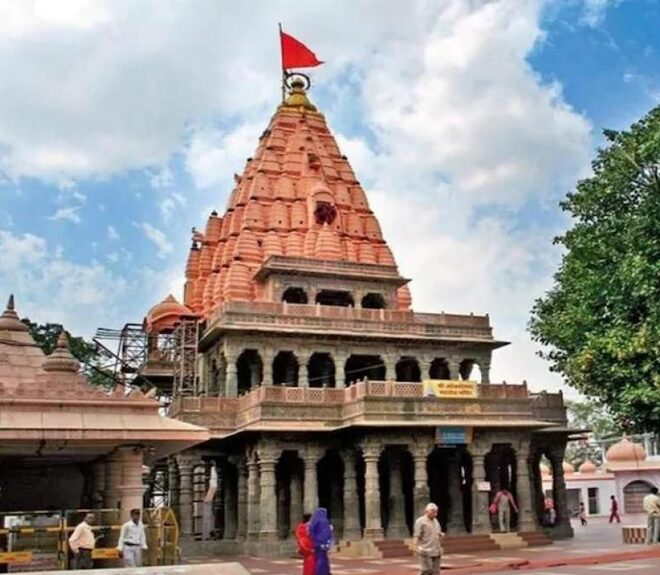 Shikhara of Shri Mahakaleshwar Temple in Ujjain under a blue sky